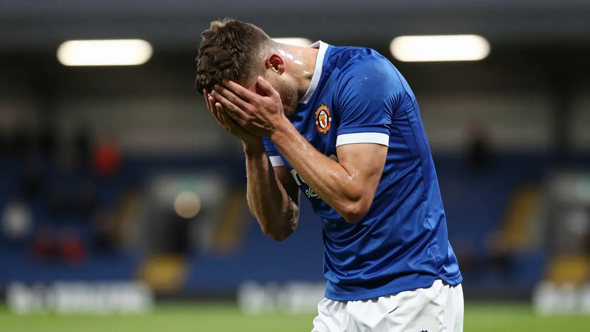 Peterborough United's Struggle Continues in 2-0 Loss to Burton Albion